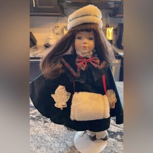 Vintage Christmas Themed Porcelein
Doll W/Hat & Muff 15"